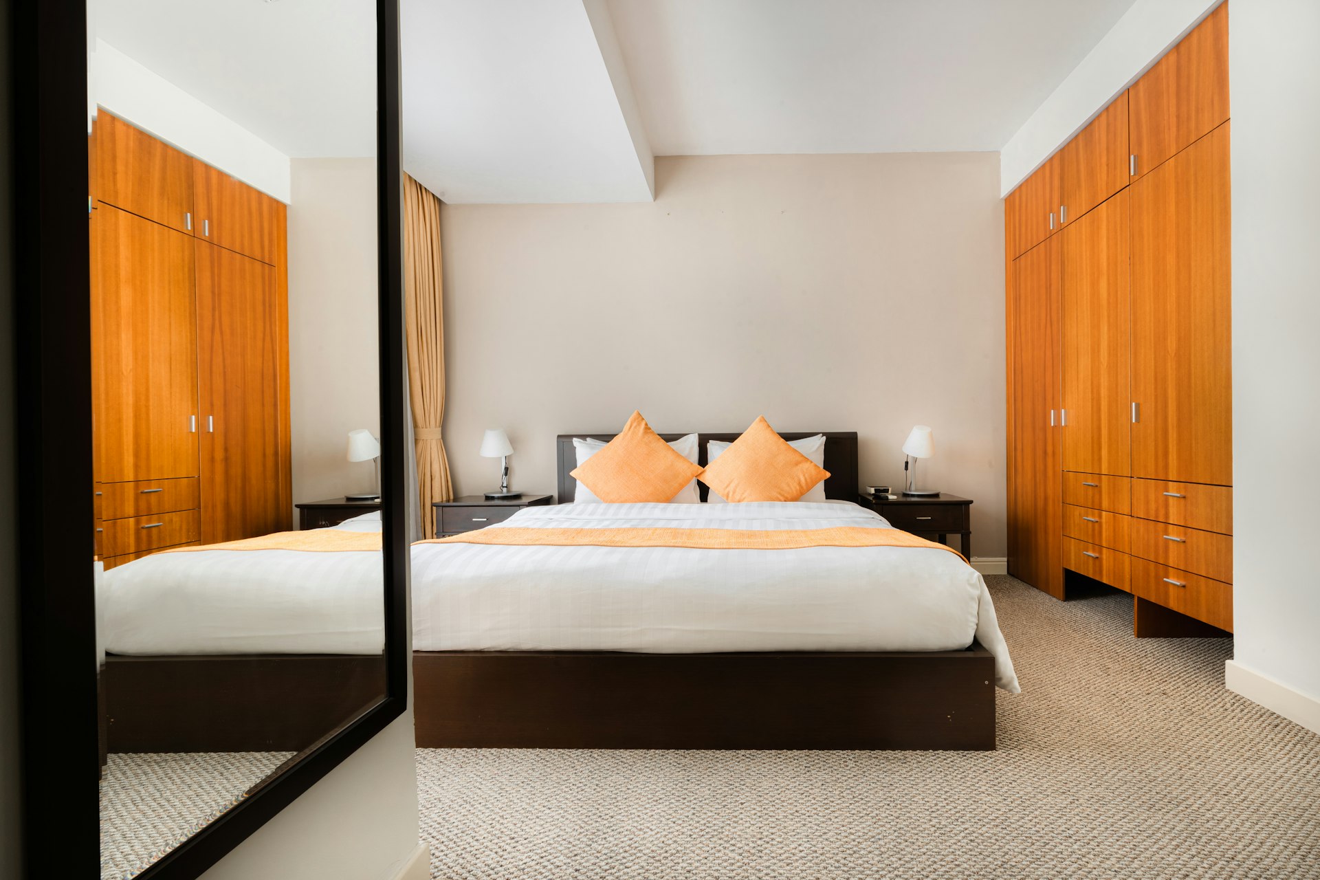 white bed linen with pillows